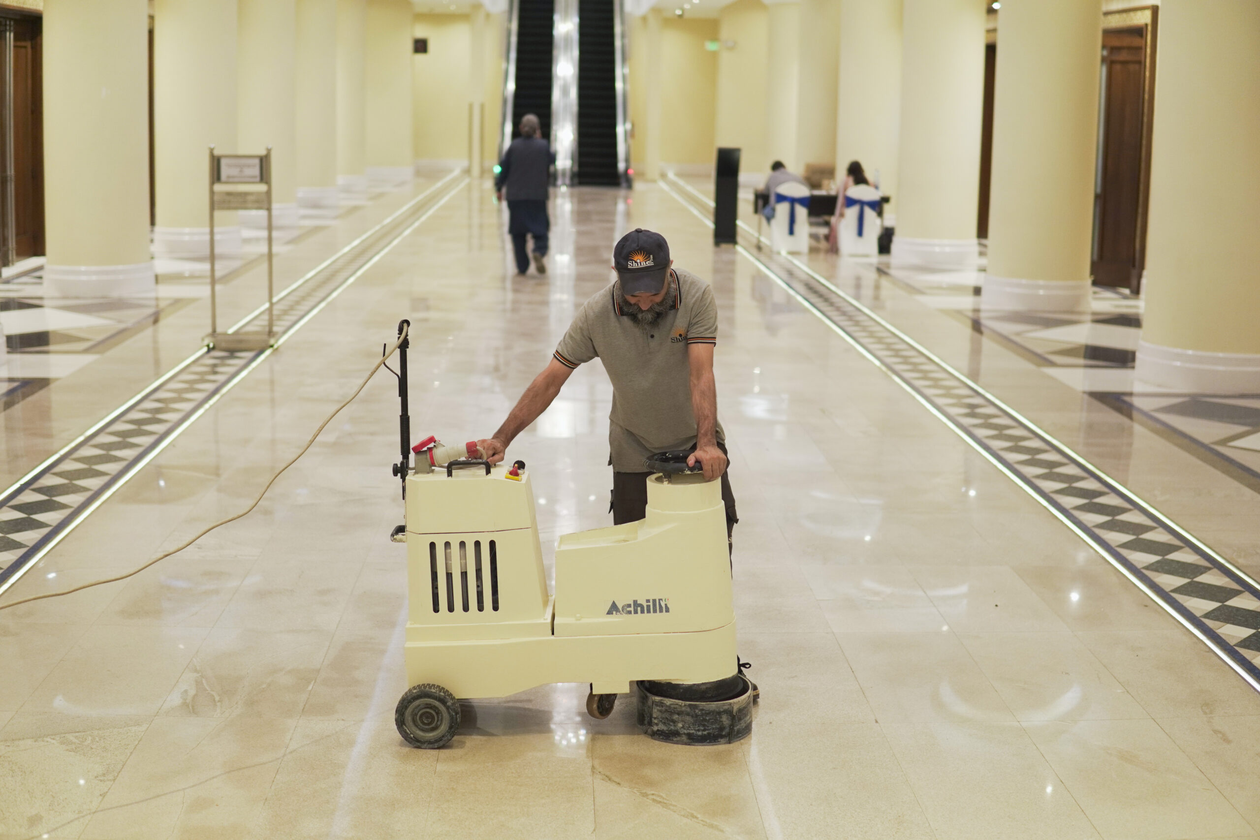 Marble floor being polished and restored to a pristine finish